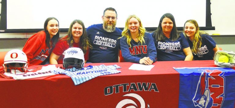 Ottawa High School senior Kennison Waltes shared her signing celebration with her family. Those at the celebration were sister Olivia Walters, sister Emily Laurie, father Ben Walters, Kennison Walters, mom Jamie Walters, and sister Kaelynn Walters. Walters will play softball for MidAmerica Nazarene. Photo by Greg Mast/The Ottawa Herald